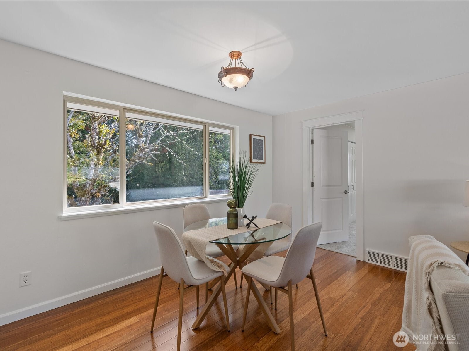 19116 106th Avenue Northeast Bothell, WA 98011 - Photo 7 of 40 a dining room with furniture and a window
