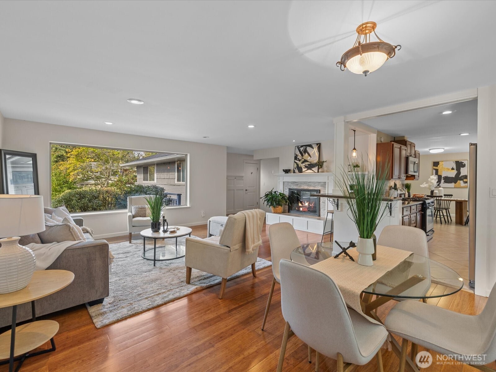 19116 106th Avenue Northeast Bothell, WA 98011 - Photo 8 of 40 a living room with furniture and a large window
