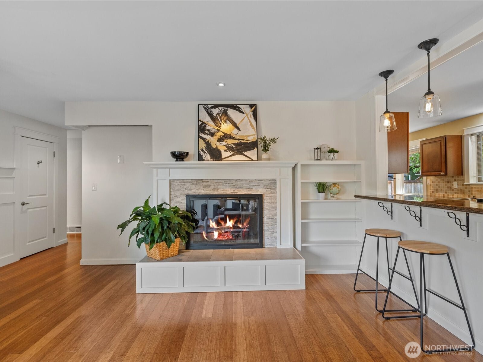 19116 106th Avenue Northeast Bothell, WA 98011 - Photo 10 of 40 a living room with furniture and a fireplace