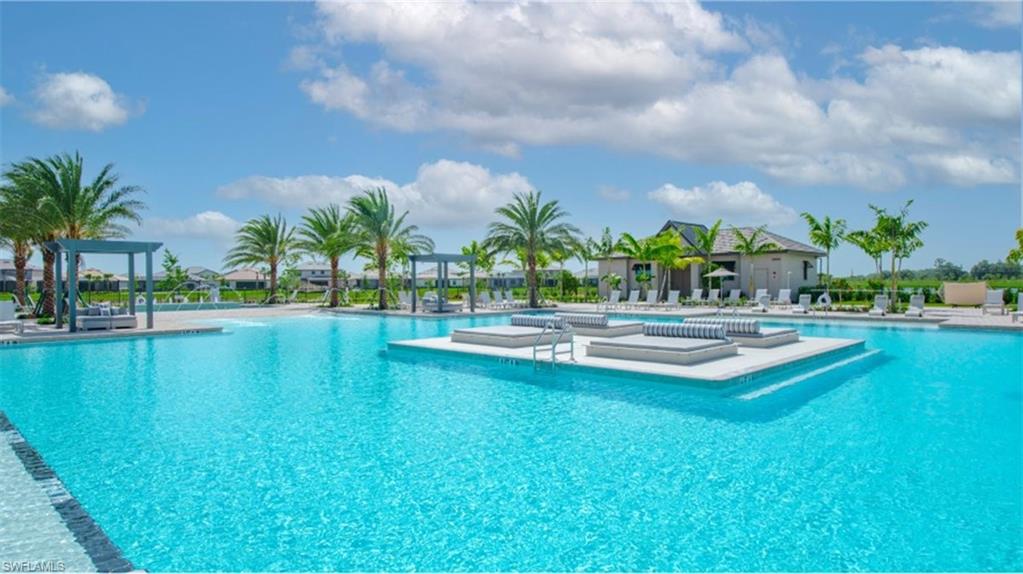 20072 Napa Loop Estero, FL 33928 - Photo 22 of 41 a swimming pool with outdoor seating and yard