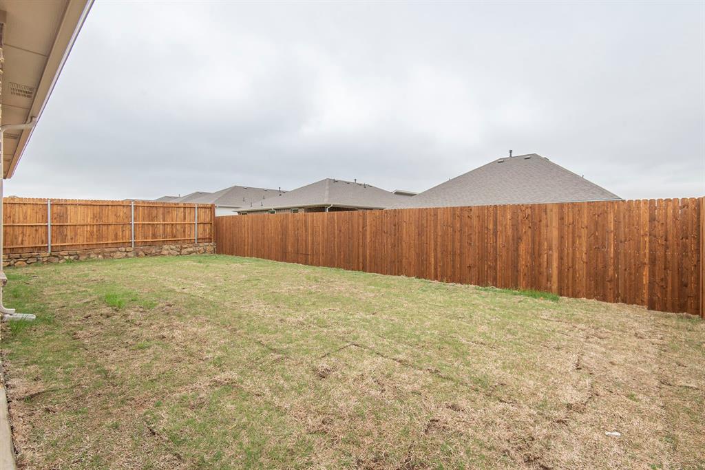 2301 Ruff Road Denton, TX 76205 - Photo 23 of 23 Expansive backyard space featuring a new wood privacy fence