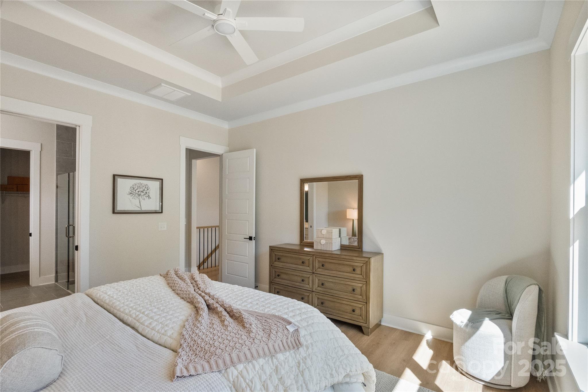 2085 Bonds Lane, Unit 26 Fort Mill, SC 29715 - Photo 25 of 41 a bedroom with a bed and dresser