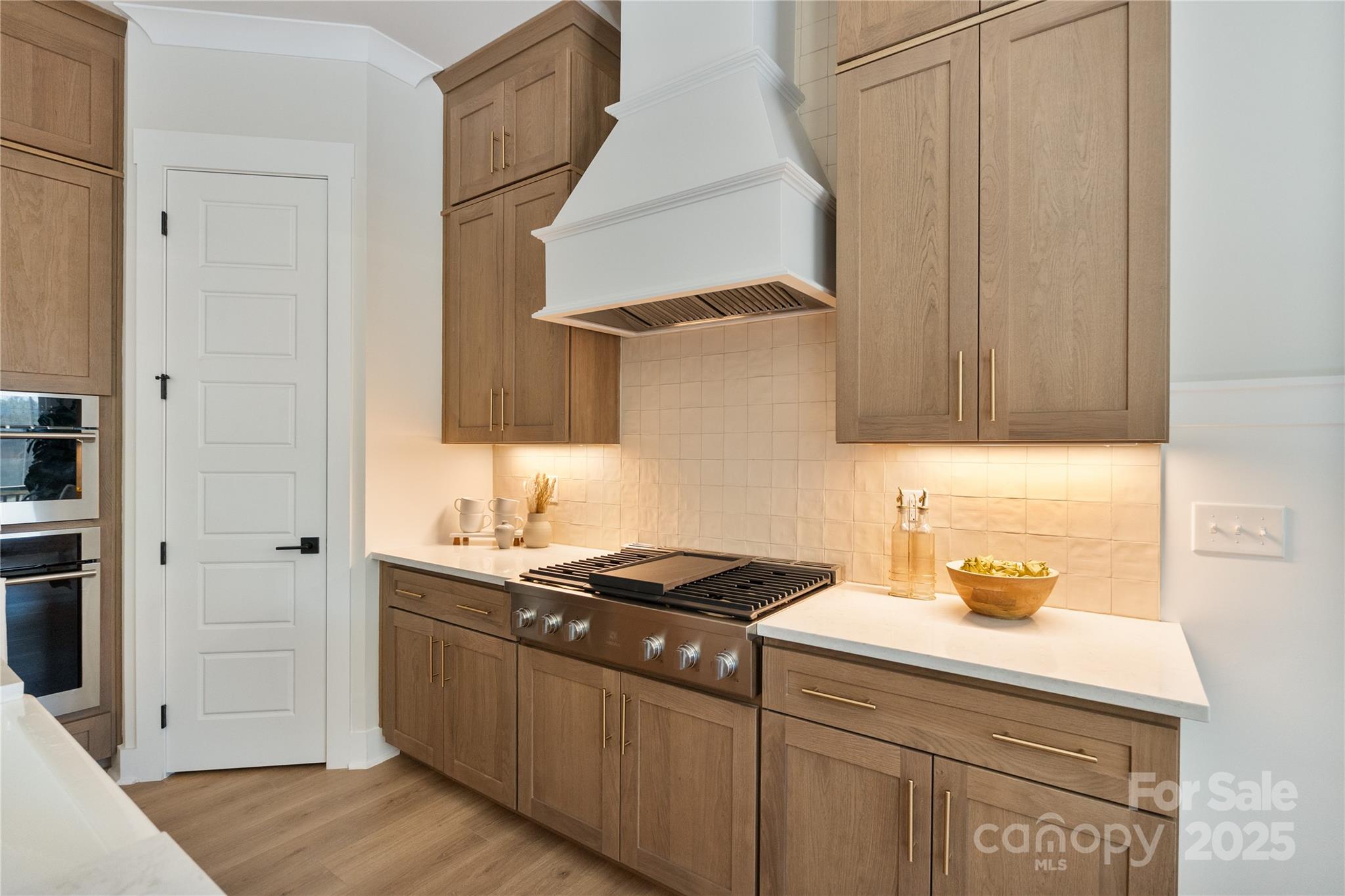 2085 Bonds Lane, Unit 26 Fort Mill, SC 29715 - Photo 3 of 41 a kitchen with a sink and cabinets