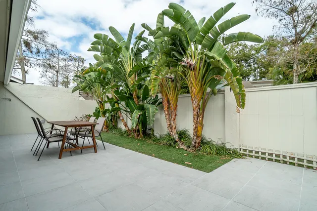 a view of a table and chairs in patio