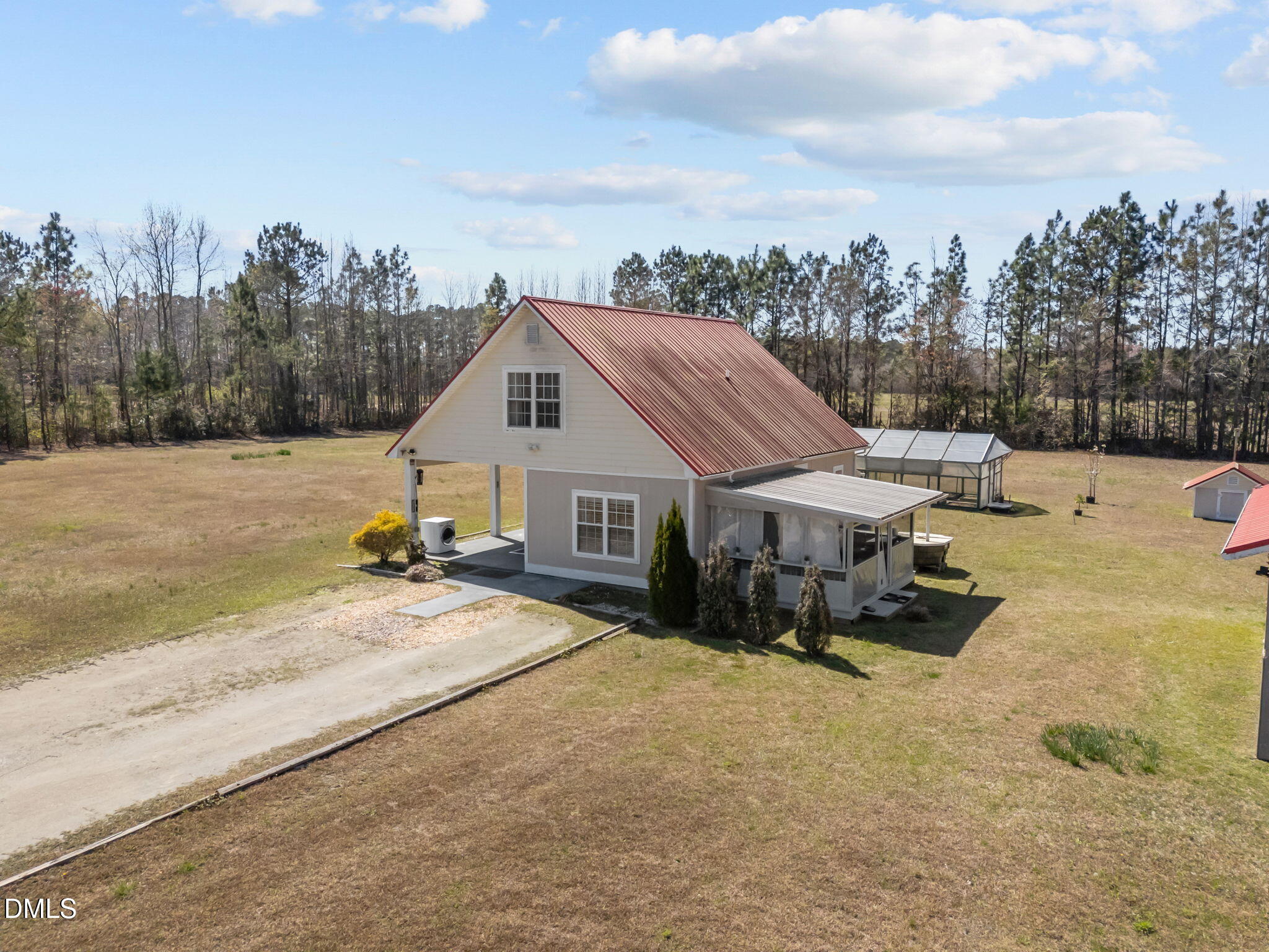 828 Chair Factory Road Nakina, NC 28455 - Photo 10 of 54 a view of a house with wooden fence