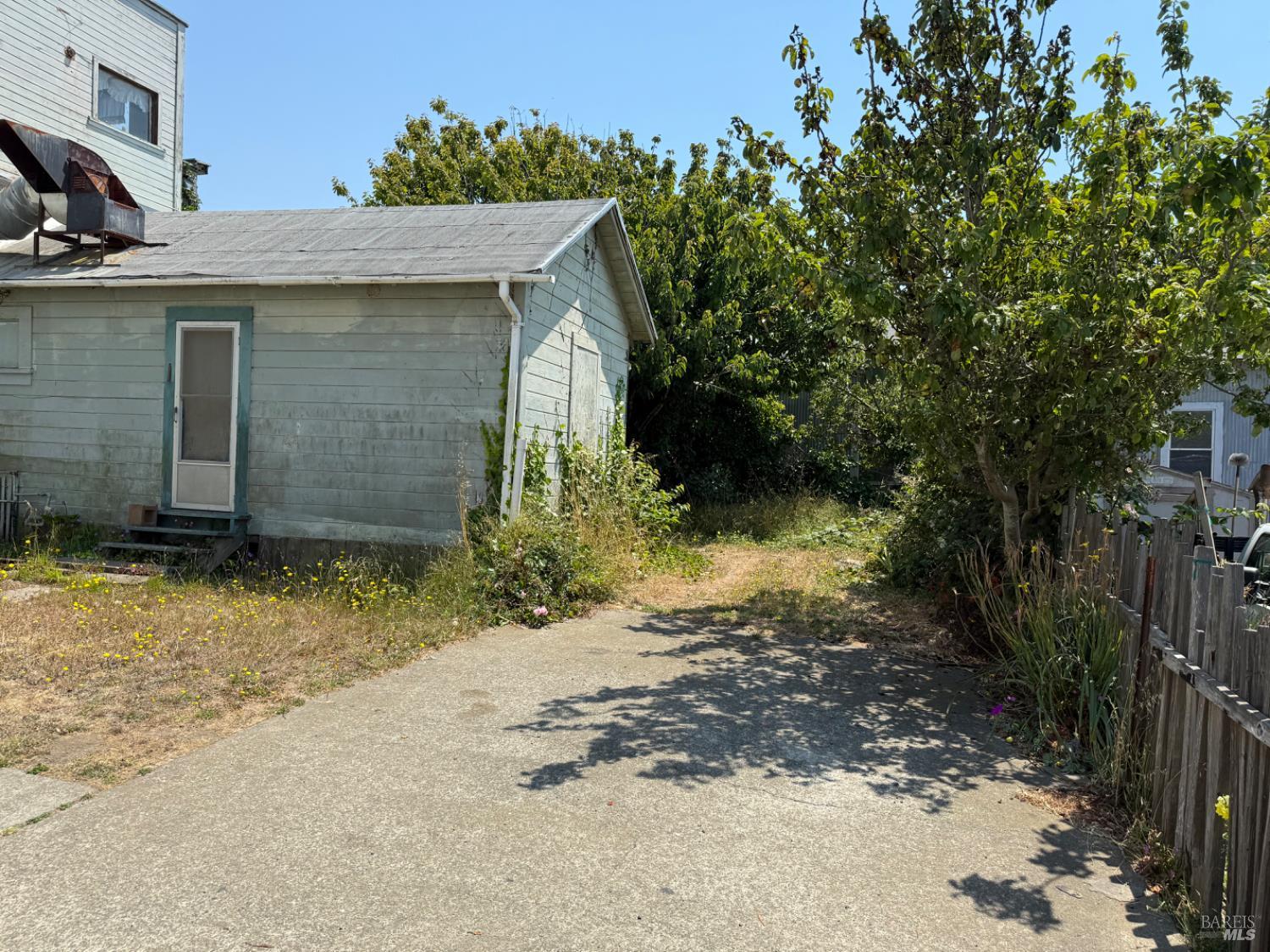 24900 Highway 1 Point Arena, CA 95468 - Photo 12 of 20 a view of a house with a yard