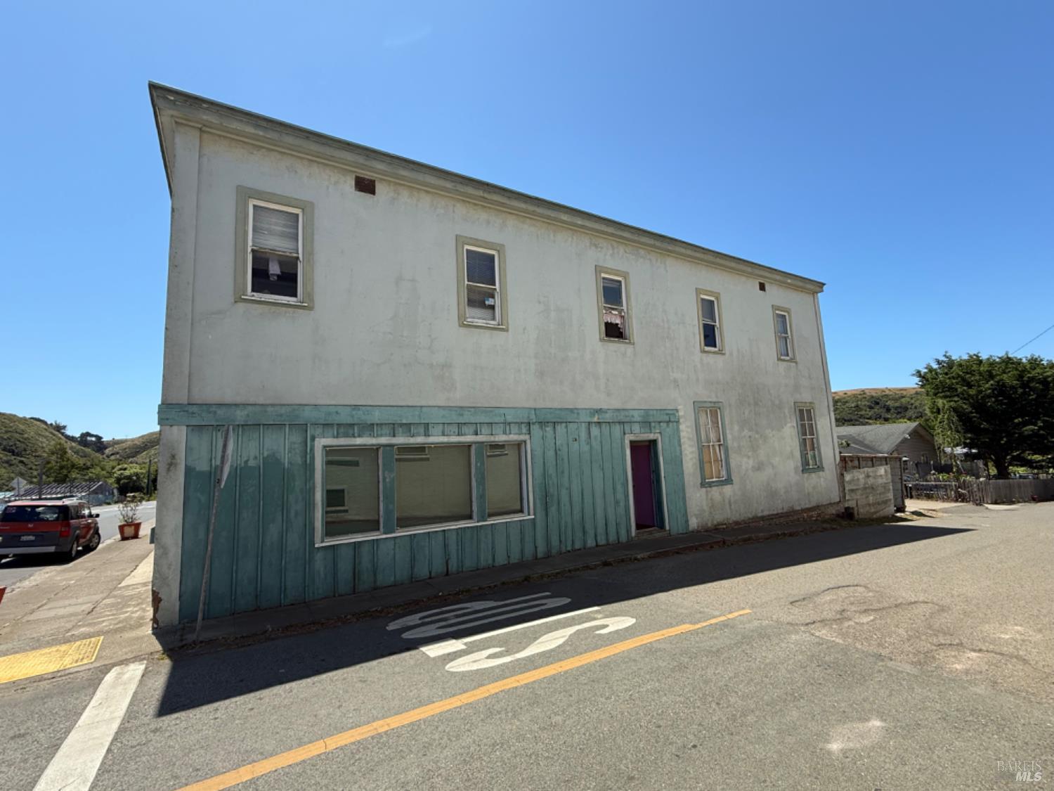 24900 Highway 1 Point Arena, CA 95468 - Photo 7 of 20 a view of a house with a street