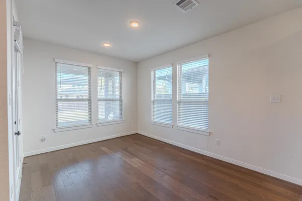 an empty room with windows