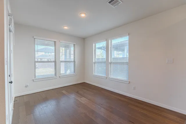 an empty room with windows