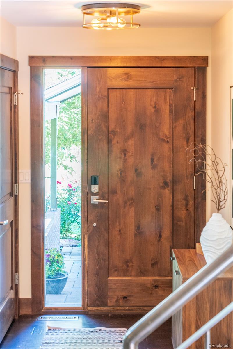 2464 Powderhorn Lane Boulder, CO 80305 - Photo 12 of 40 a bathroom with a shower and a wooden floor