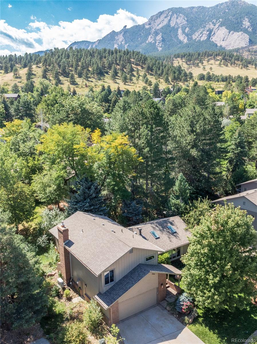 2464 Powderhorn Lane Boulder, CO 80305 - Photo 3 of 40 an aerial view of a house with a yard