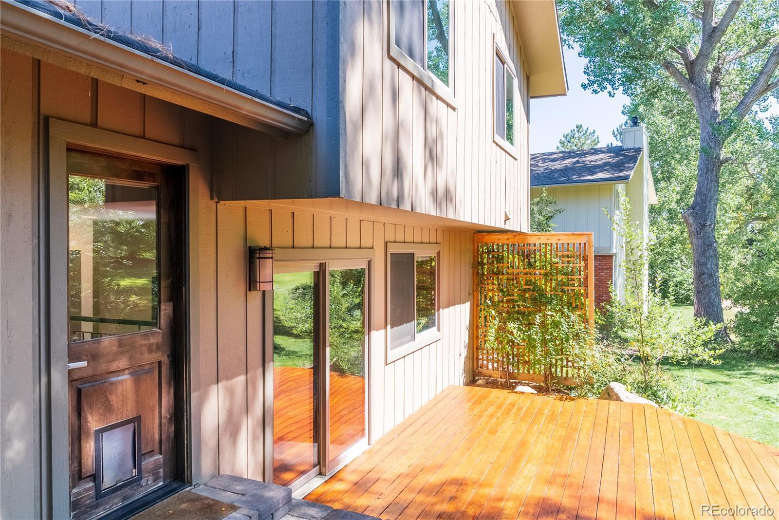 2464 Powderhorn Lane Boulder, CO 80305 - Photo 39 of 40 a view of a brick house with a large windows