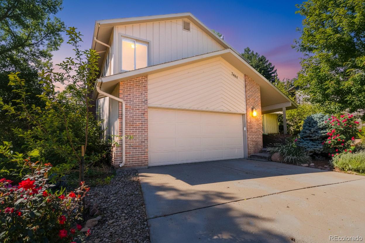 2464 Powderhorn Lane Boulder, CO 80305 - Photo 6 of 40 a backyard of a house with flower plants