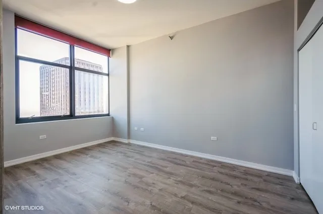 a view of a hallway with washer and dryer