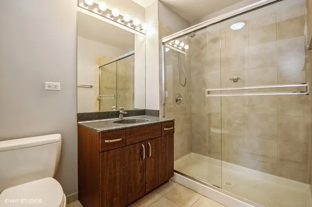 a view of a balcony and a floor to ceiling window