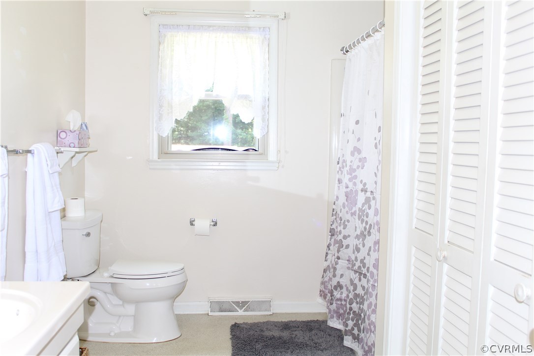 20600 Rowanty Road Carson, VA 23830 - Photo 14 of 25 a bathroom with a toilet and a shower