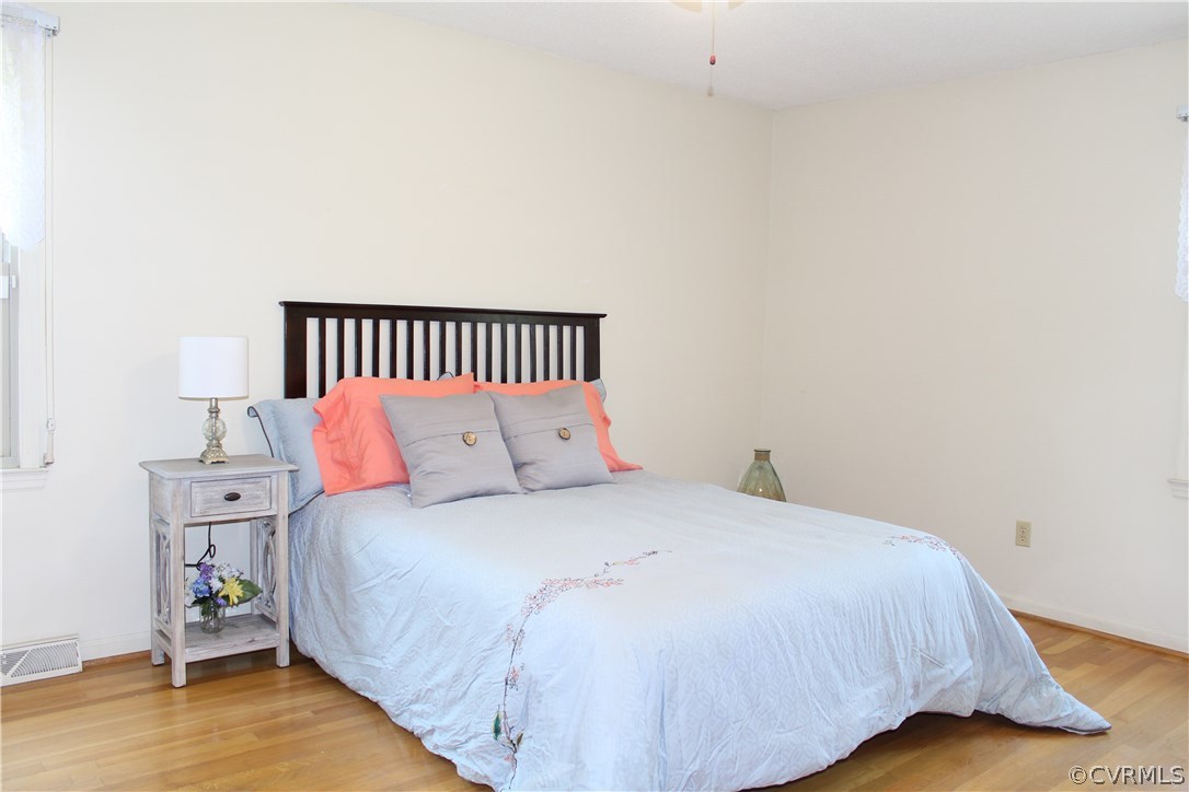 20600 Rowanty Road Carson, VA 23830 - Photo 19 of 25 a bedroom with a bed and a night stand