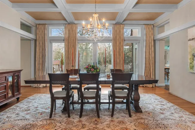 a kitchen with stainless steel appliances granite countertop a stove a sink island and a refrigerator