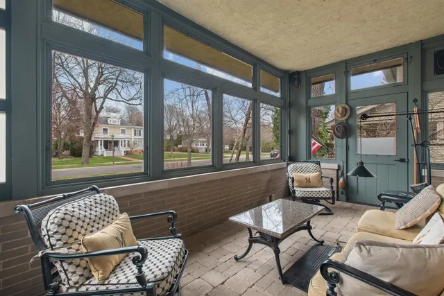 a bathroom with a granite countertop tub a sink and a bathtub
