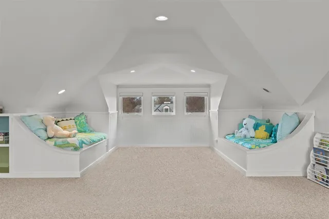 a view of a backyard with sitting area