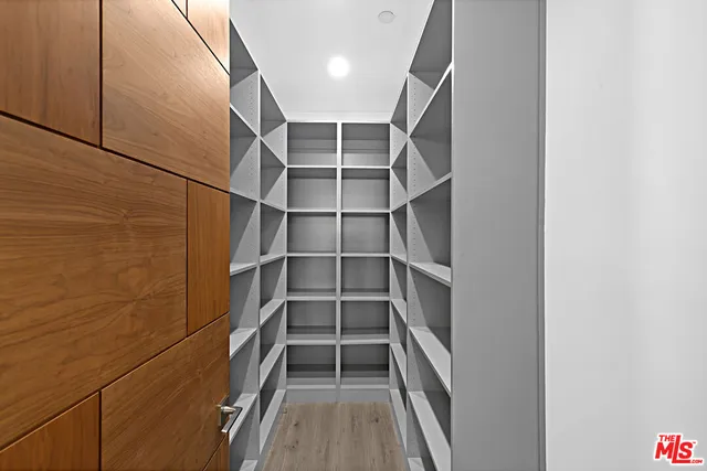 a view of an empty walk in closet