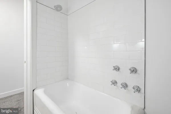 a bathroom with a bathtub