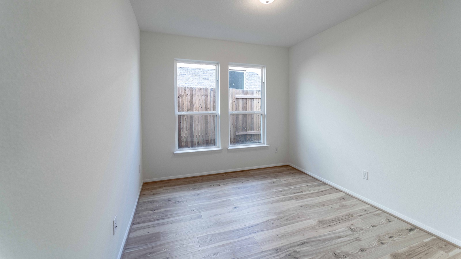 294 Rubber Tree Way Buda, TX 78610 - Photo 15 of 19 Spare room featuring light wood-style flooring