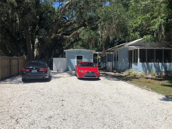 a car parked in front of a house