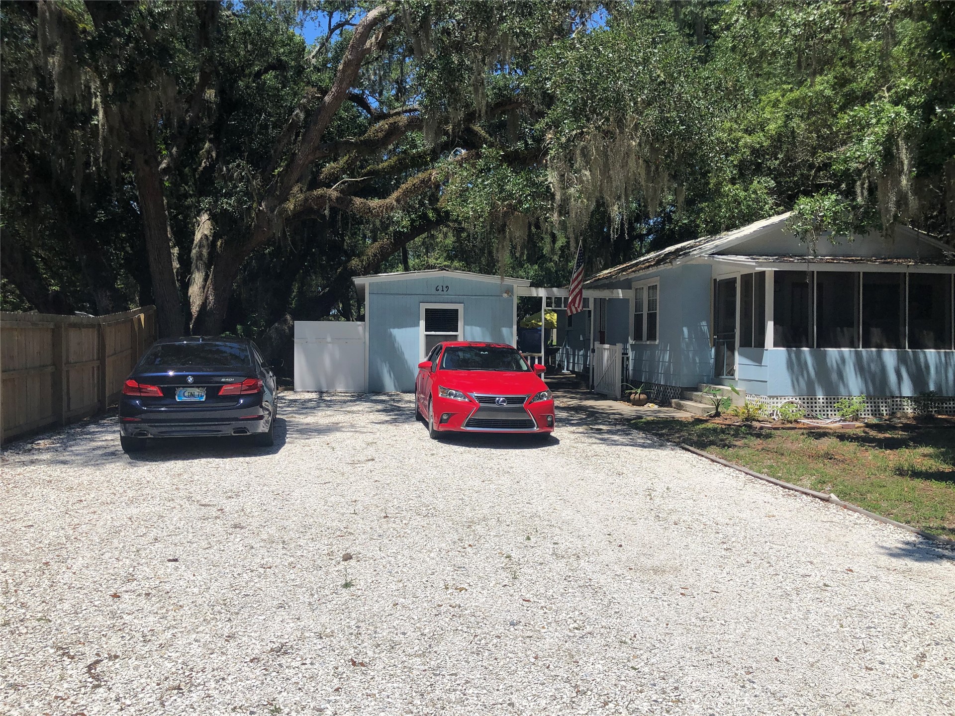 619 North 15th Street Fernandina Beach, FL 32034 - Photo 1 of 11 a car parked in front of a house