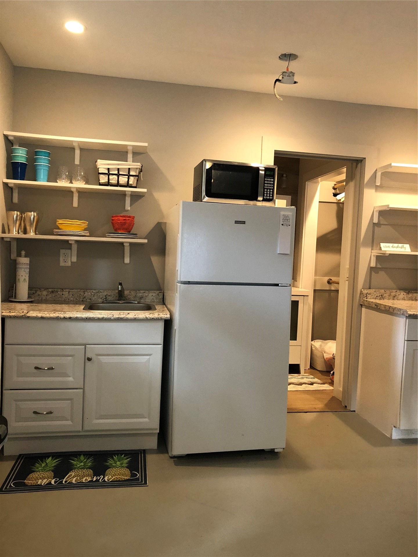 619 North 15th Street Fernandina Beach, FL 32034 - Photo 5 of 11 a kitchen with refrigerator and window