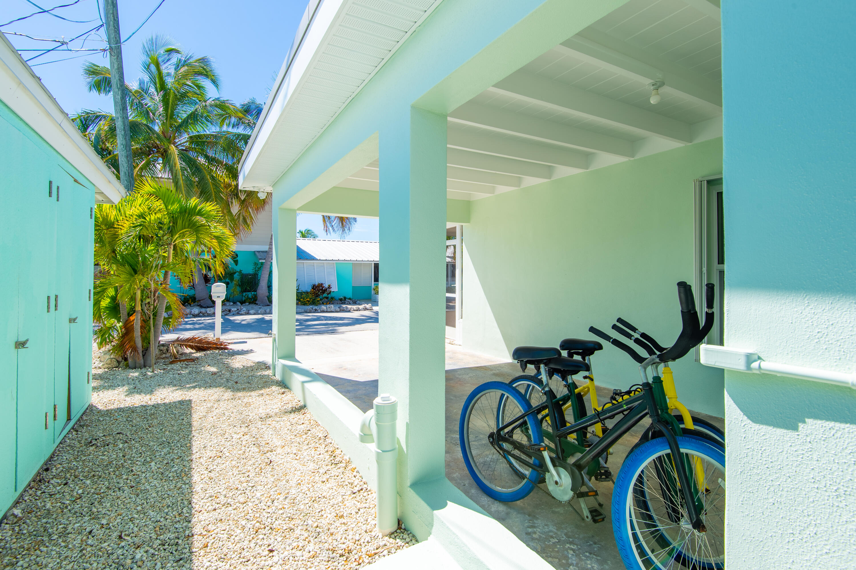 11322 3rd Avenue Marathon, FL 33050 - Photo 33 of 39 a view of a porch with chairs and potted plants