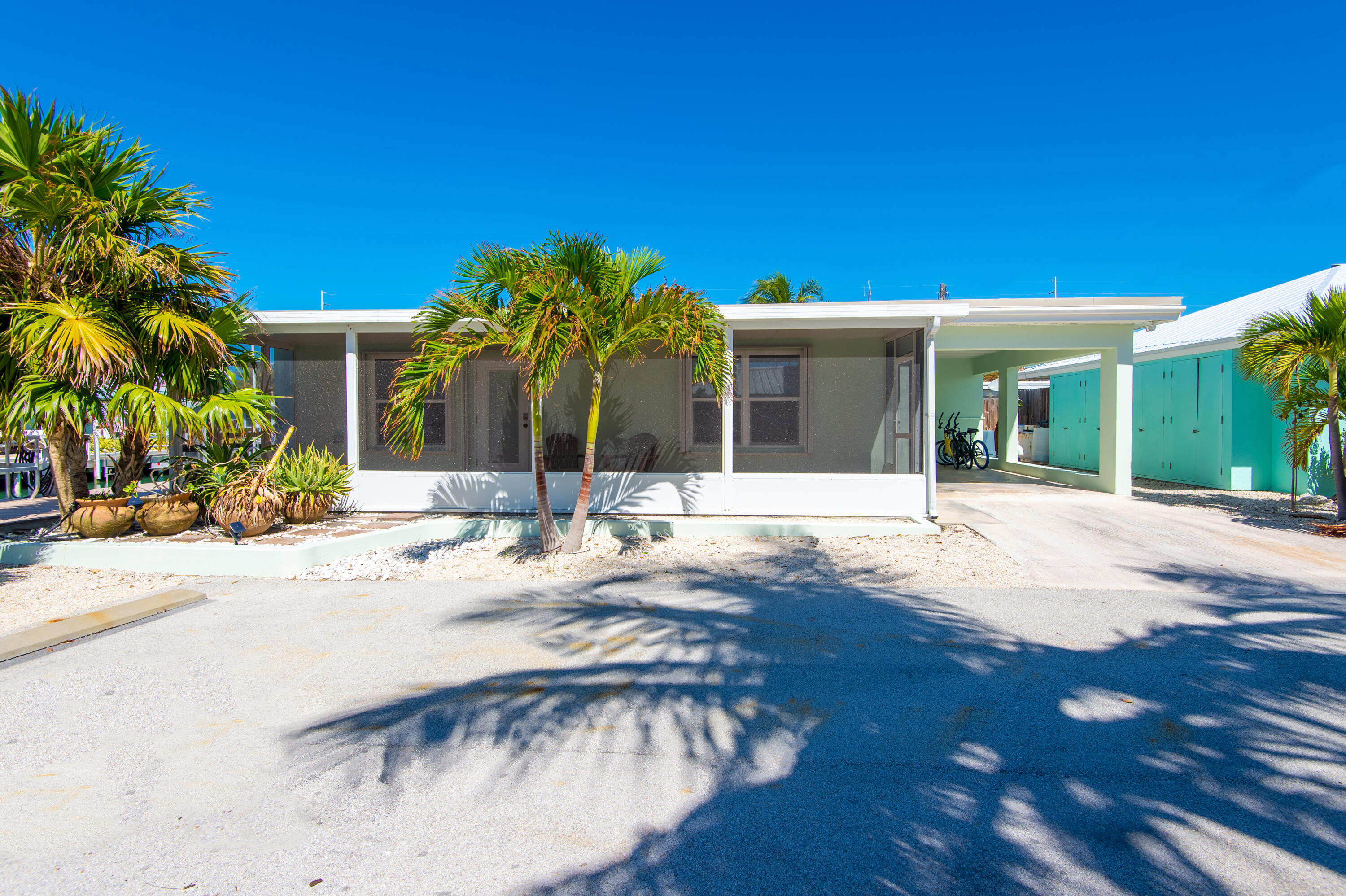 11322 3rd Avenue Marathon, FL 33050 - Photo 36 of 39 a view of a house with a swimming pool