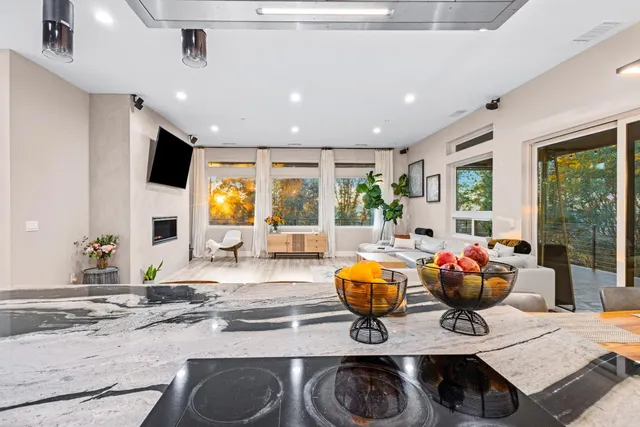 a bedroom with a bed and a table in it