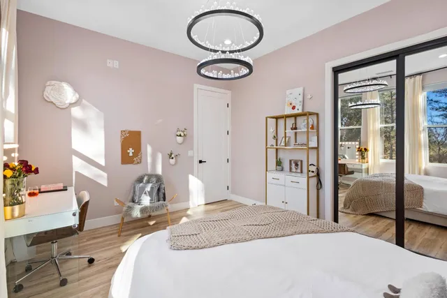 a workspace with furniture and a potted plant