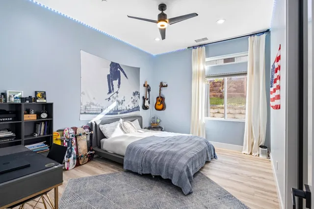 a view of a chairs and table in patio