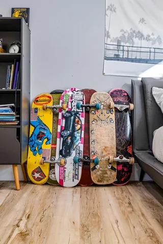 a view of a house with a yard and pathway