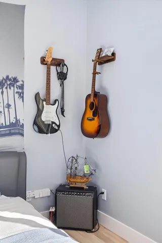 a front view of house with yard outdoor seating and barbeque oven