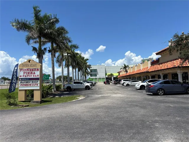 a view of a street with cars