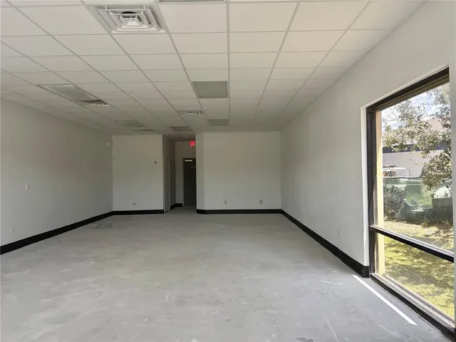 a view of a room with sliding glass door