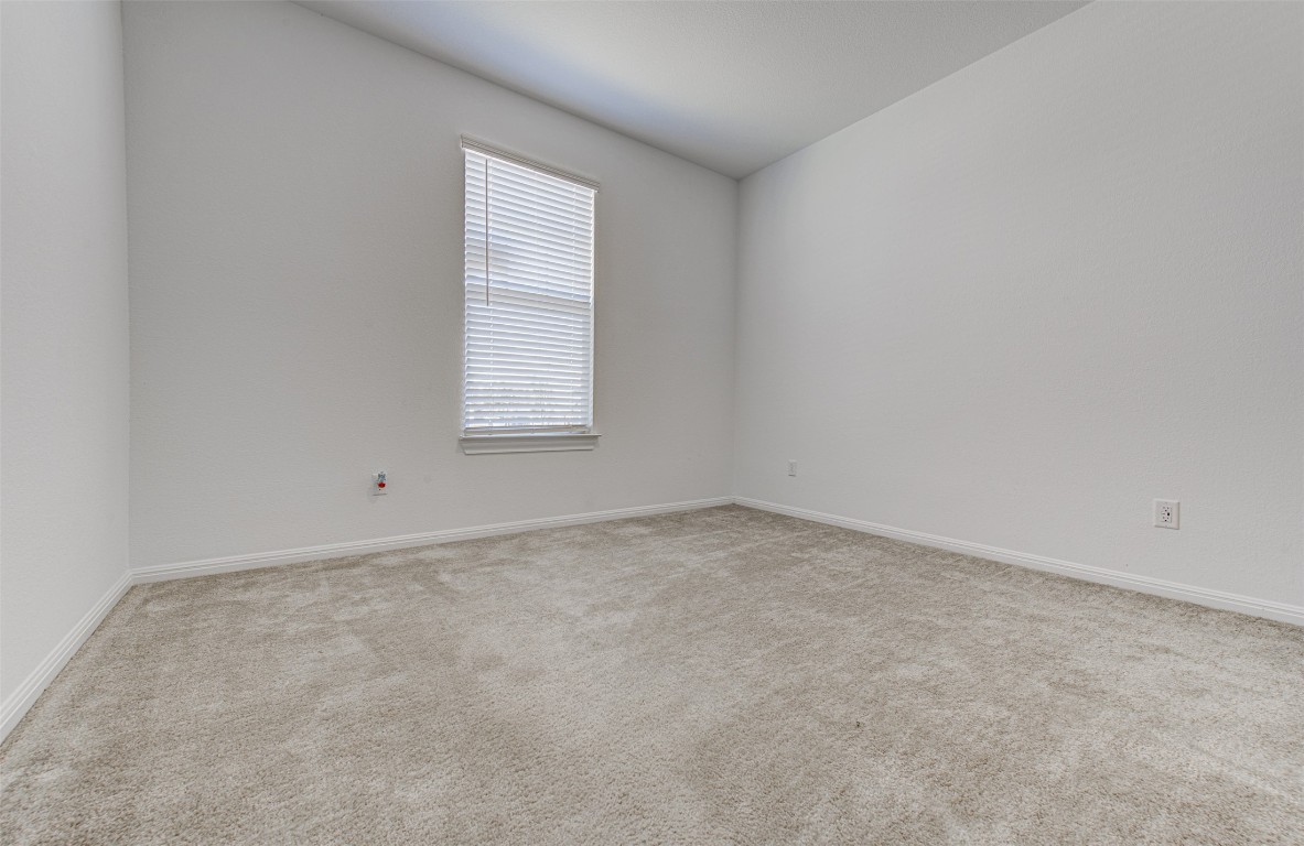 169 Slenderleaf Drive Marble Falls, TX 78654 - Photo 11 of 24 an empty room with a window