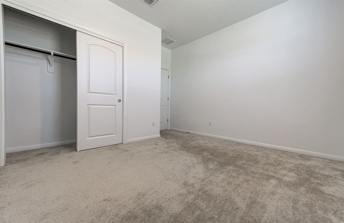169 Slenderleaf Drive Marble Falls, TX 78654 - Photo 12 of 24 an empty room with closet area
