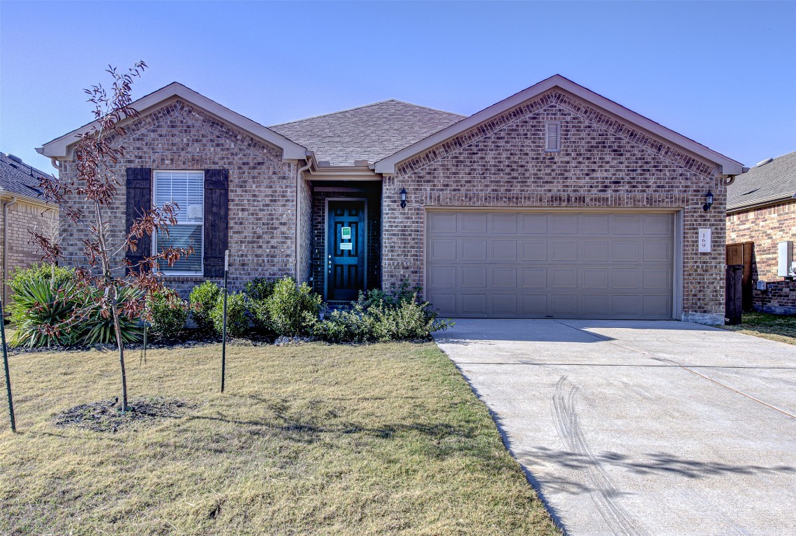 169 Slenderleaf Drive Marble Falls, TX 78654 - Photo 2 of 24 a front view of a house with a porch