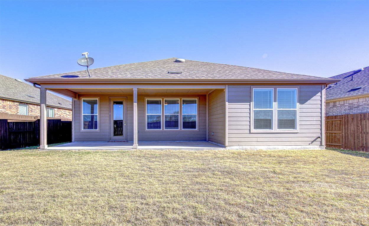 169 Slenderleaf Drive Marble Falls, TX 78654 - Photo 21 of 24 a front view of a house having yard