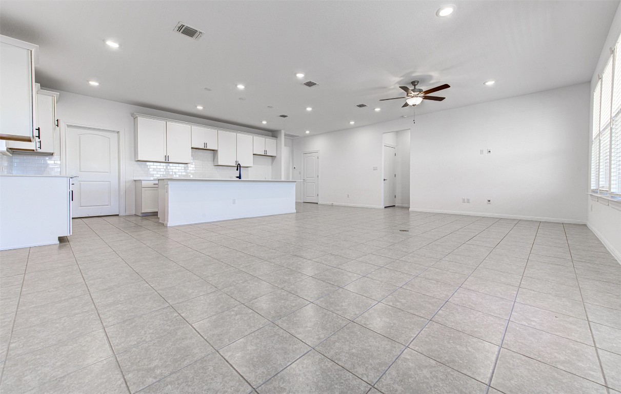 169 Slenderleaf Drive Marble Falls, TX 78654 - Photo 5 of 24 a view of kitchen with granite countertop cabinets and window