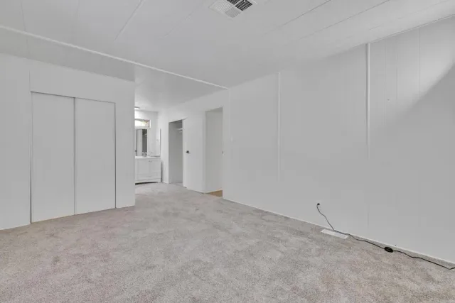 a view of bathroom with dual sinks
