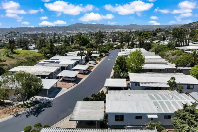 a view of a swimming pool with sitting area
