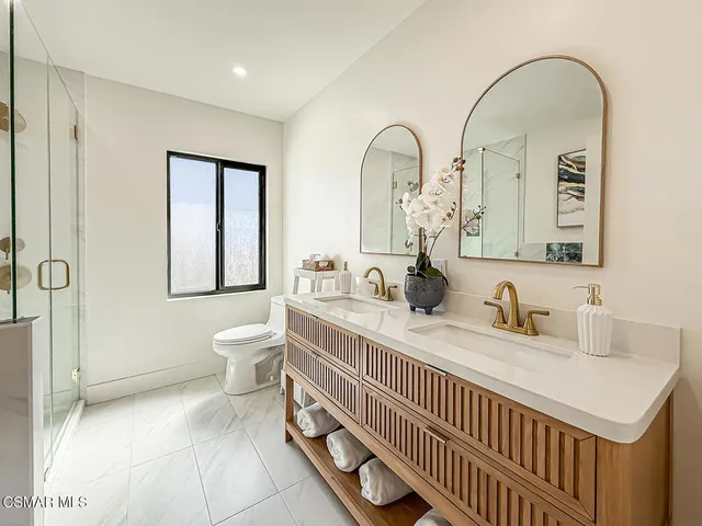 a view of a backyard with a swimming pool