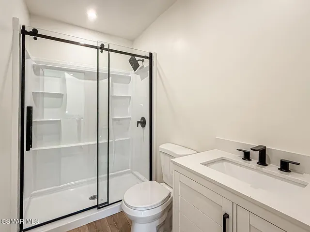 a view of a chairs with table in patio