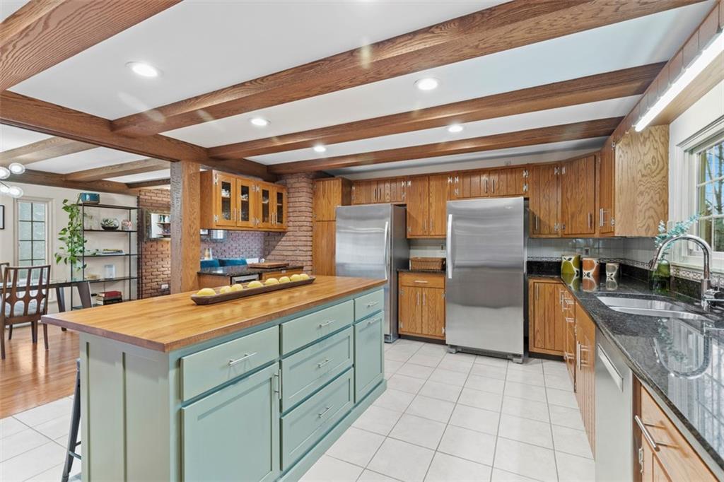 85 Lambeth Drive Pittsburgh, PA 15241 - Photo 12 of 47 a kitchen with stainless steel appliances granite countertop a stove and a sink