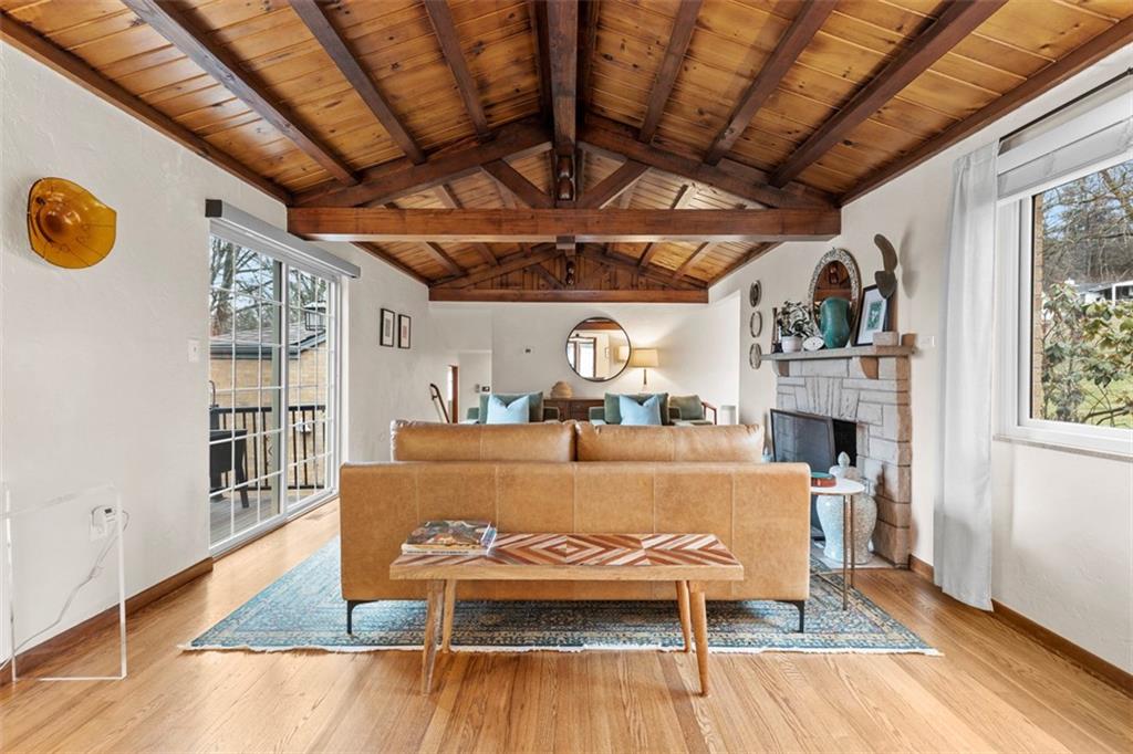 85 Lambeth Drive Pittsburgh, PA 15241 - Photo 20 of 47 a view of living room kitchen with furniture and fireplace